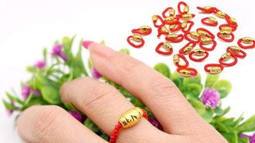 红绳金珠戒指(红绳金珠戒指是什么意思)